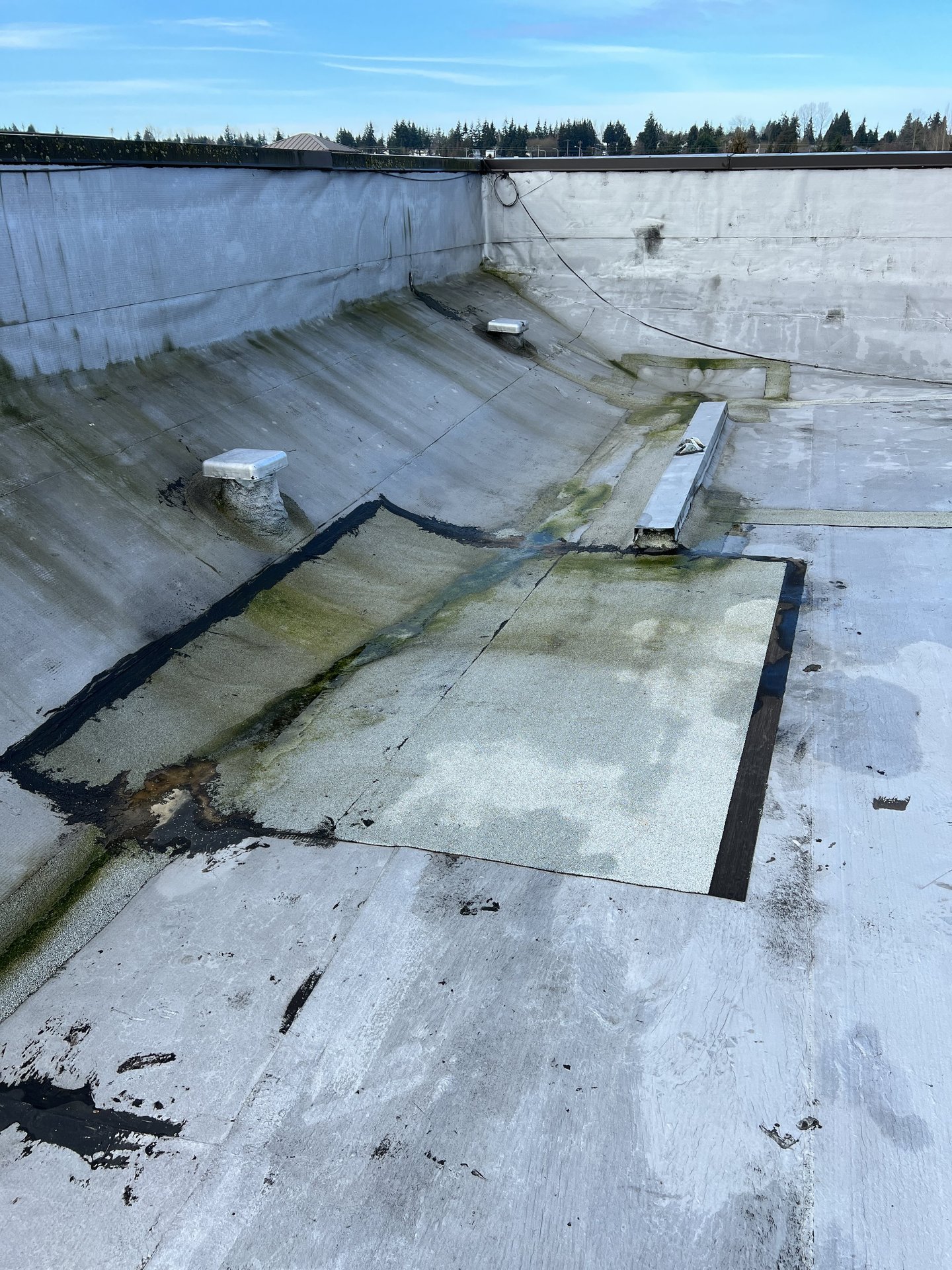 Commercial office building roof inspection findings