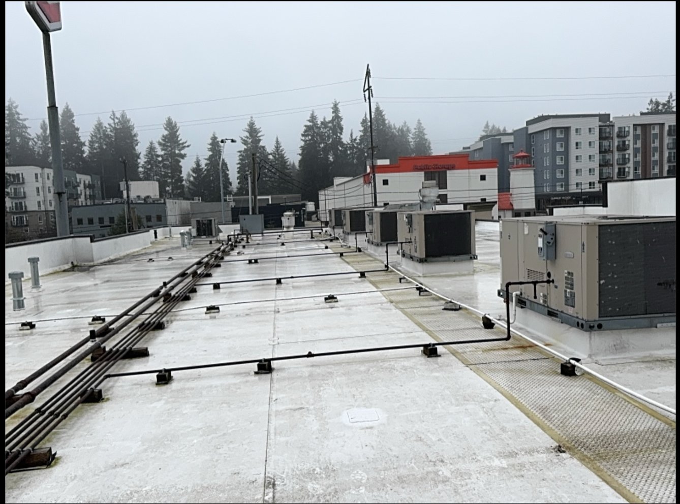 Commercial property rooftop inspection — HVAC, electrical, and roof systems